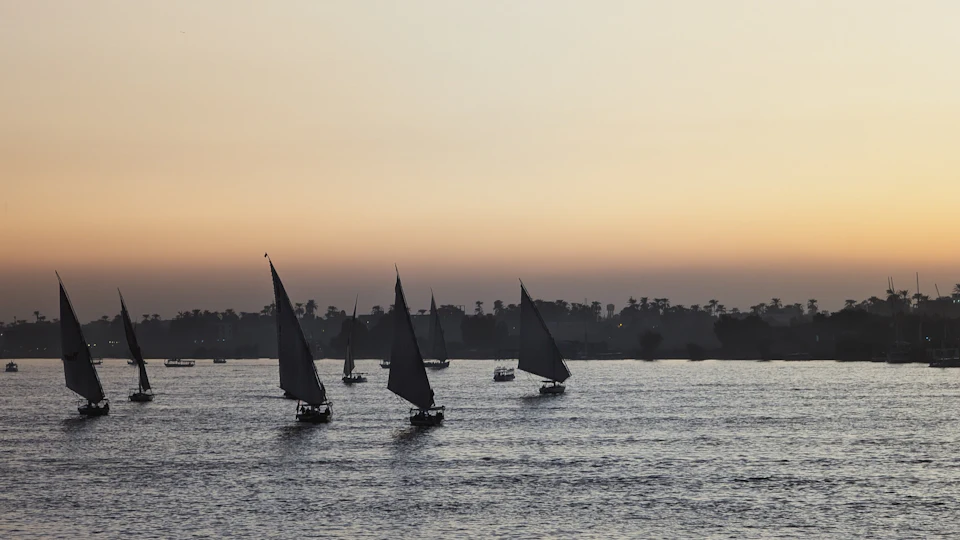 Feluccas on the Nile at sunset
